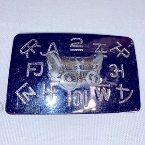 Chambers Belt Co. USA Belt Buckle Featuring Covered‎ Wagon Branding
Marks